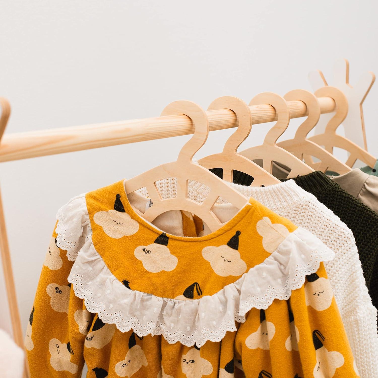 image:imageWooden Toddler Clothes Hangers Baby Hangers Clothing Rack for Nursery Kids Room Decor Montessori Furniture Child Size Wardrobe Wood Toddler Gift Set of 10 Hangers Star NaturalNatural